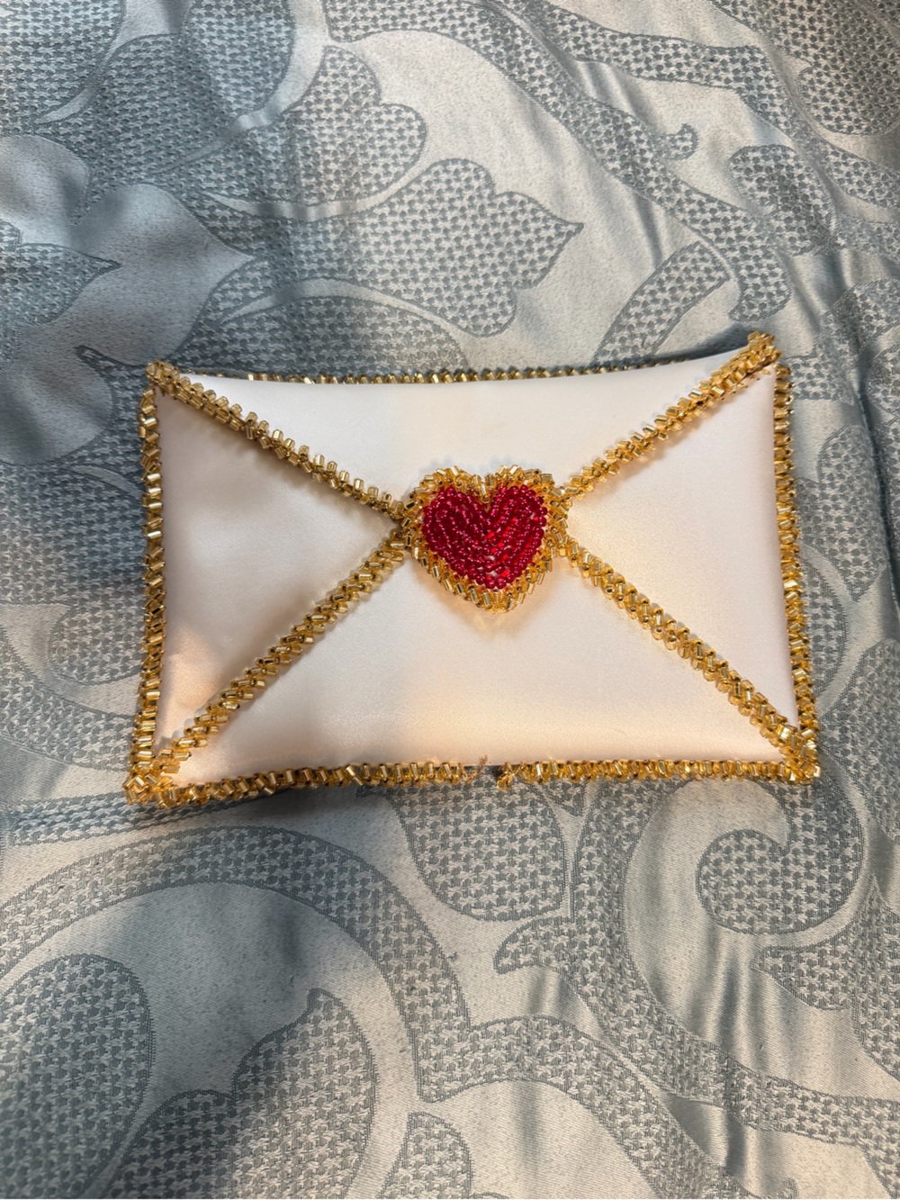 vanina hand beaded love letter clutch